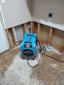 water heater flooding cleanup